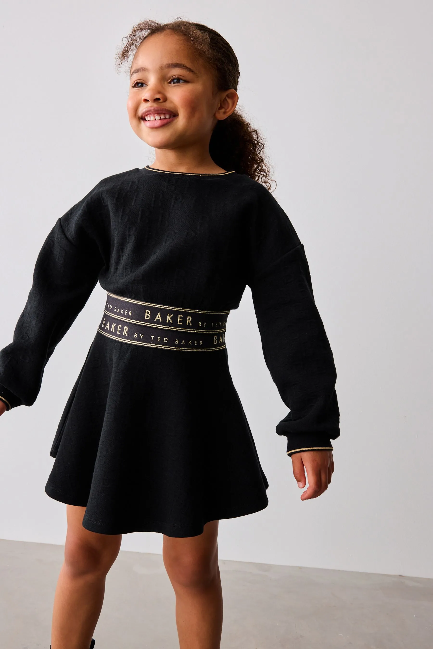Baker by Ted Baker Cropped Long Sleeve Sweater and Skirt Black Set