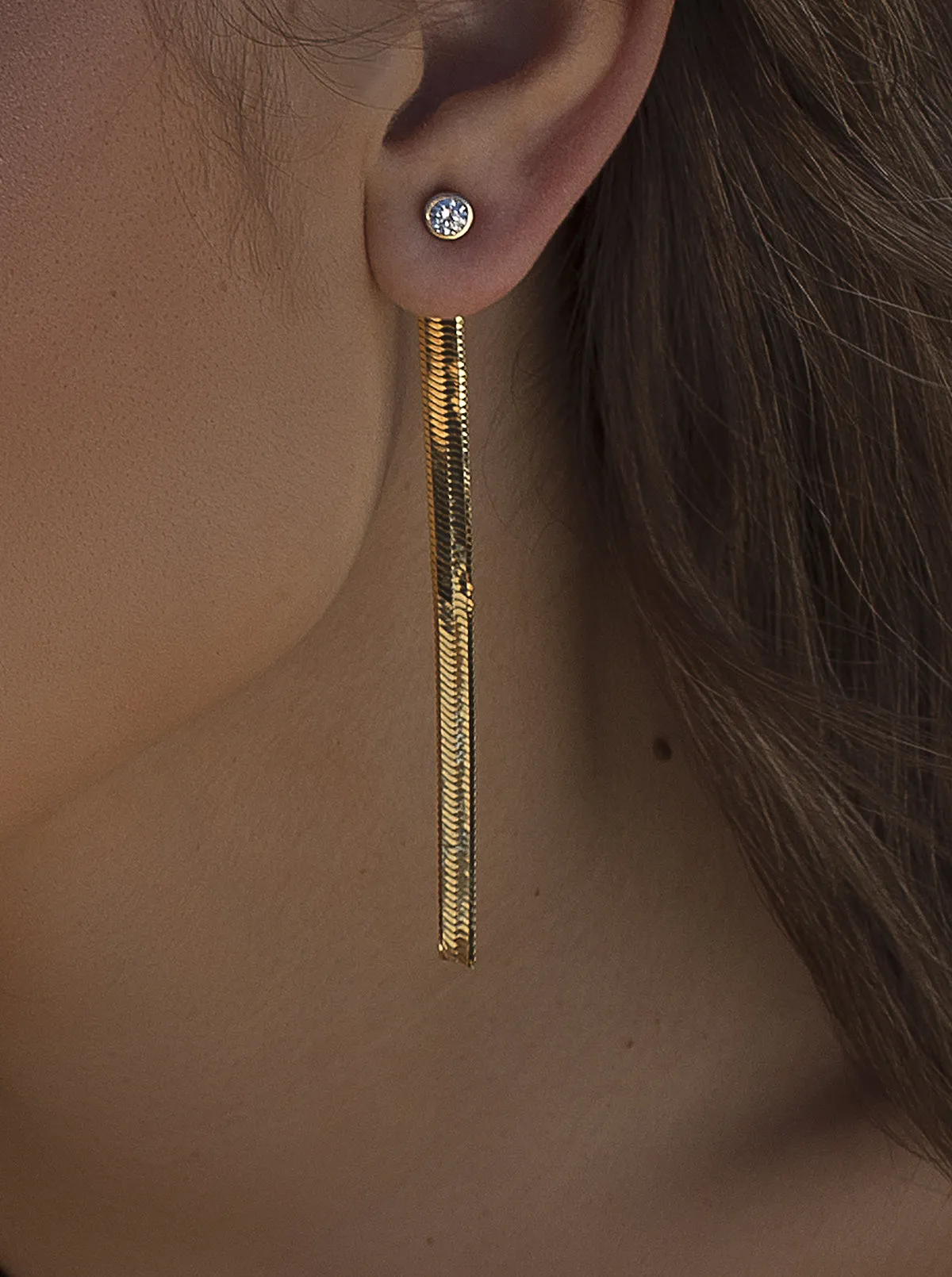 Pendientes largos plata baada en oro diseo snake con circonita